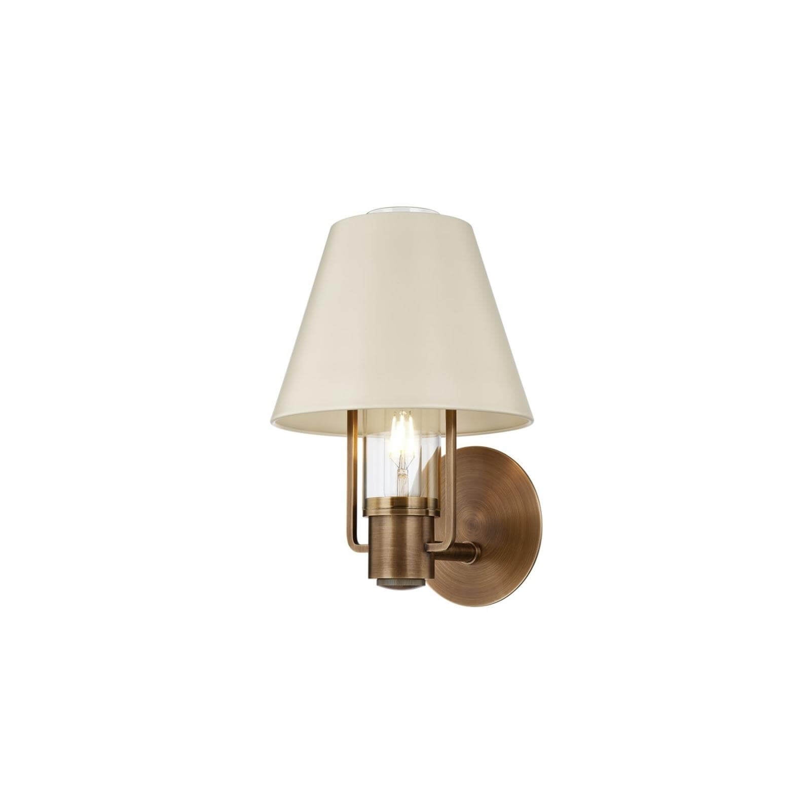 Brass wall sconce with ivory lamp shade
