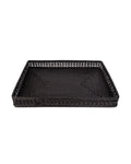 Black woven tray on a white background