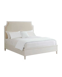 Wood bed frame upholstered headboard is complemented with sandy white performance fabric that has the look and feel of woven linen