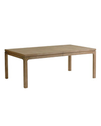 A rectangular dining table made of wood with a simple, contemporary design featuring parson's legs and a natural wood finish.