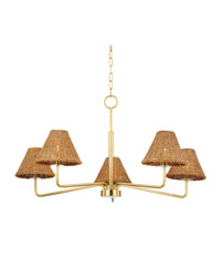 A chandelier with aged brass finish and a woven rattan shade, featuring slender hooked arms.