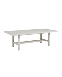 A rectangular dining table with a soft oyster-white finish on an aluminum frame, featuring a tabletop umbrella centerpiece.