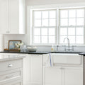 White kitchen with blue and ivory striped cotton rug
