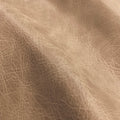 A close-up of a tan leather fabric