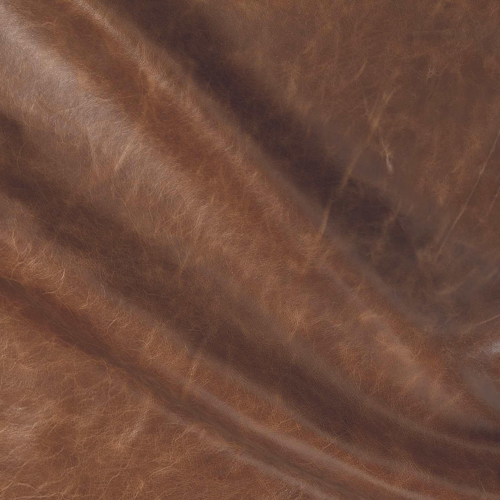 A close-up of a dark brown leather fabric