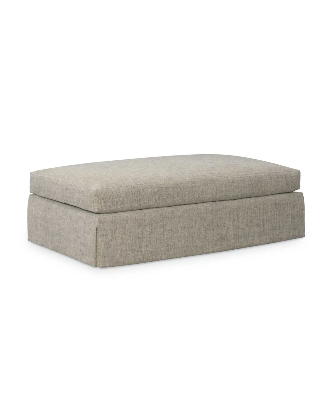A gray upholstered rectangular ottoman with a skirted design.