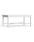 A white rectangular outdoor coffee table with scalloped edge details made of aluminum.