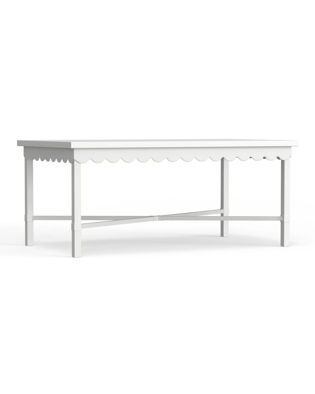 A white rectangular outdoor coffee table with scalloped edge details made of aluminum.