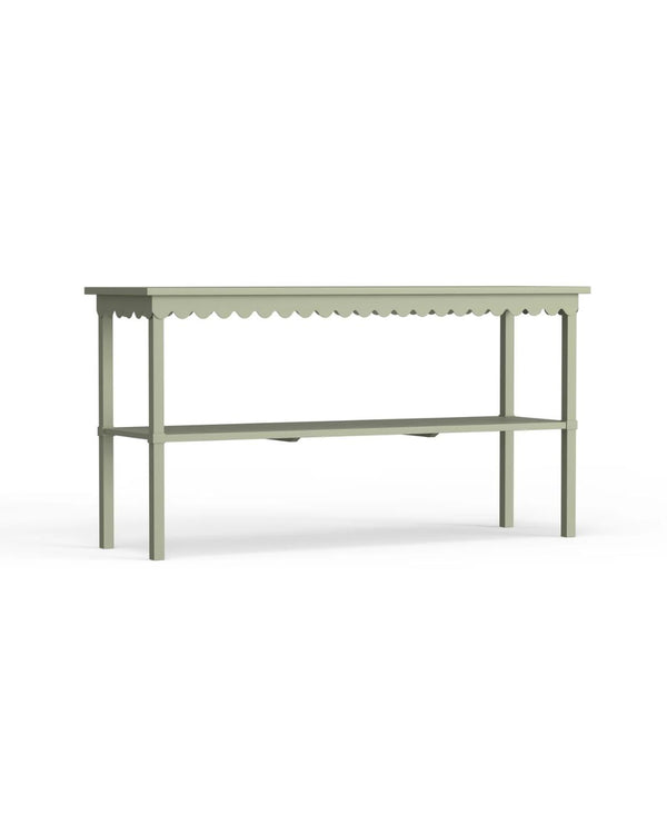A rectangular green console table with a scalloped edge design and metal legs.