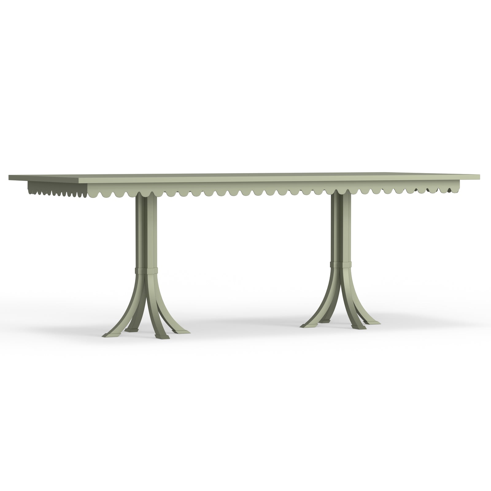 A rectangular Riviera dining table with scalloped edge details, displayed in a sage green color.