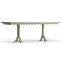 A rectangular Riviera dining table with scalloped edge details, displayed in a sage green color.