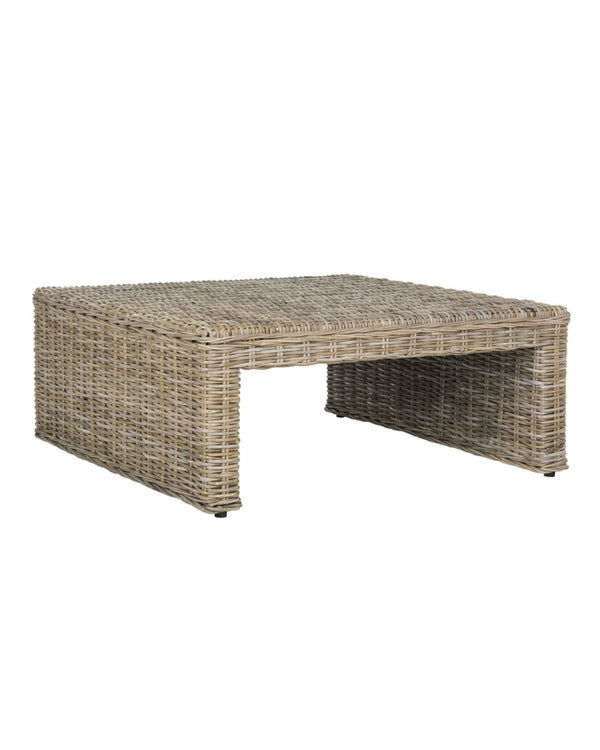 A square brown coffee table made of woven rattan, with a low profile and a warm wood finish.