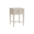 Wood nightstand with a light finish. One drawer with a white circular drawer pull