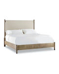 Bed frame constructed with soft, rounded edges and combined with sand-blasted greige and antique white oak finishes
