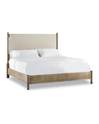 Bed frame constructed with soft, rounded edges and combined with sand-blasted greige and antique white oak finishes