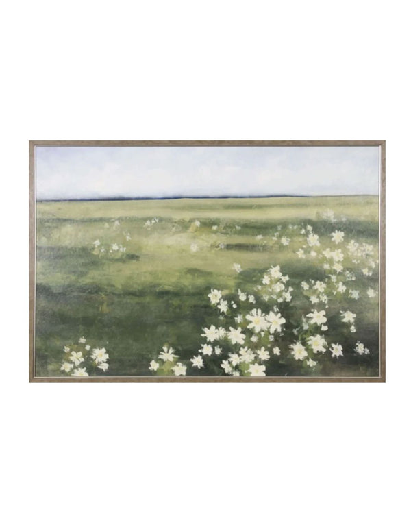 A framed artwork depicting a field of white flowers with green and blue accents in a landscape style.