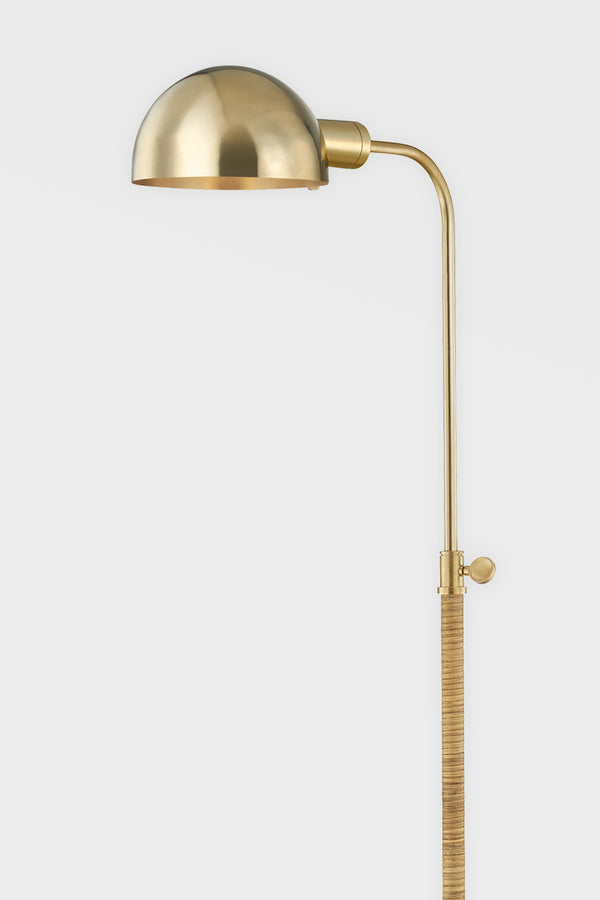 Rattan wrapped brass floor lamp