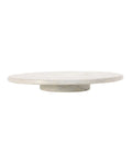 A white marble lazy Susan with a smooth surface and rounded shape, placed against a neutral background.