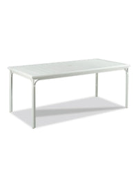 A white rectangular outdoor dining table with a slatted top and a powder-coated aluminum base with rattan pole bindings.