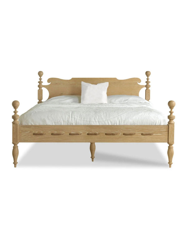 Solid oak bed frame in a limewash finish with rope detailing.