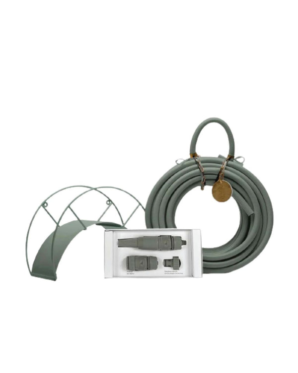 A garden hose kit with a soft green hose, brass fittings, and a storage rack, displayed on a white background.