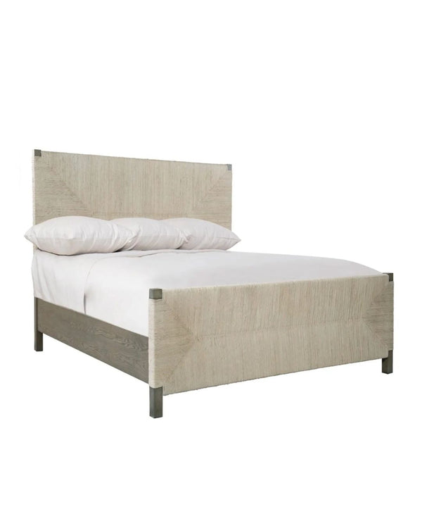 A beige Spencer bed with a woven pattern on the headboard and footboard, made from solid oak, with a natural wood finish and abaca weaving.