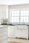 White kitchen with blue and ivory striped cotton rug