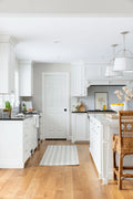 White kitchen with Blue and ivory striped cotton runner