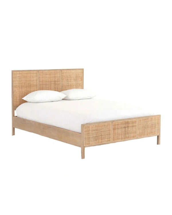 Bed frame designed with a natural mango frame and woven cane inset