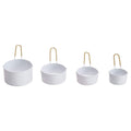 White and Brass Measuring Cups