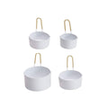 White and Brass Measuring Cups