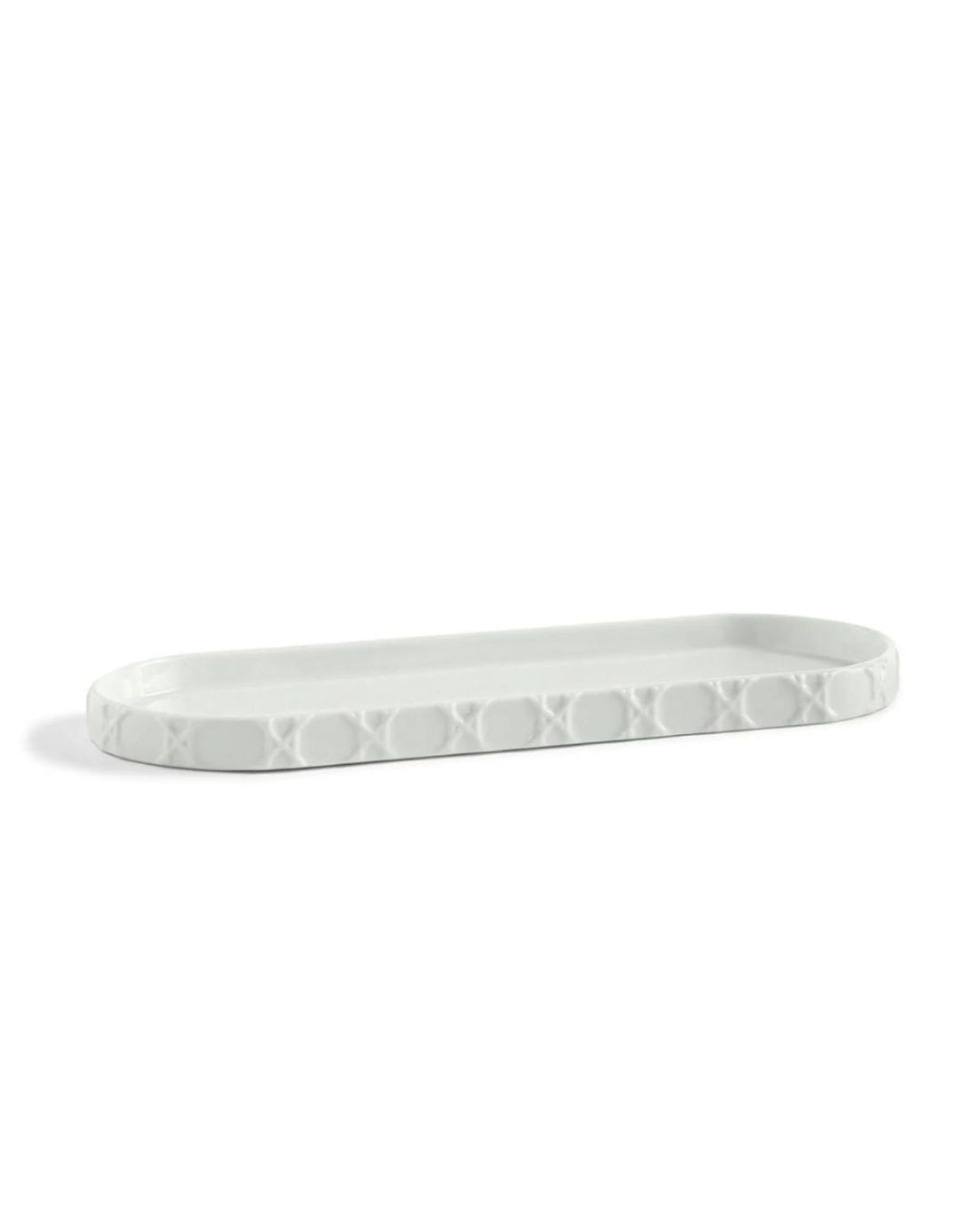 A white rectangular porcelain bathroom tray with embossed rattan-inspired design.