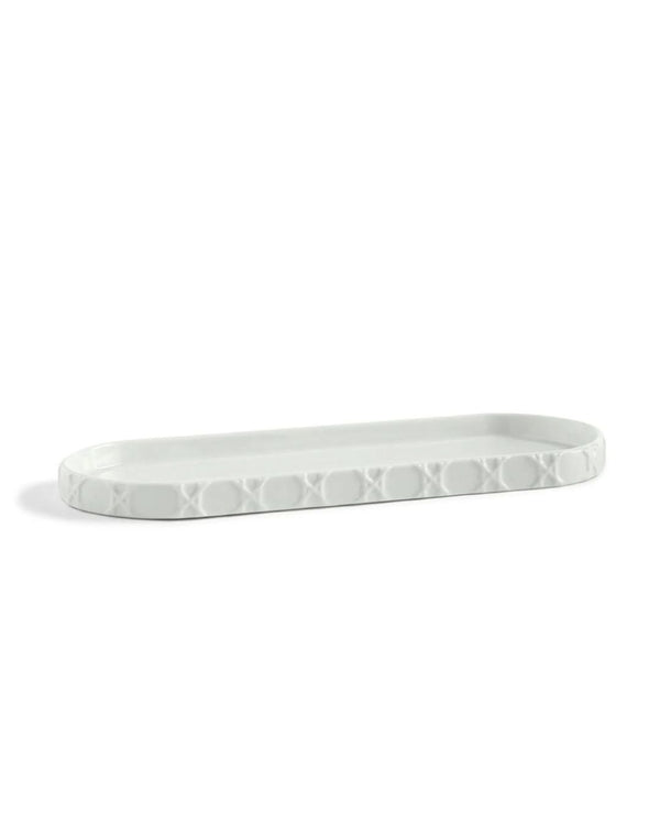 A white rectangular porcelain bathroom tray with embossed rattan-inspired design.